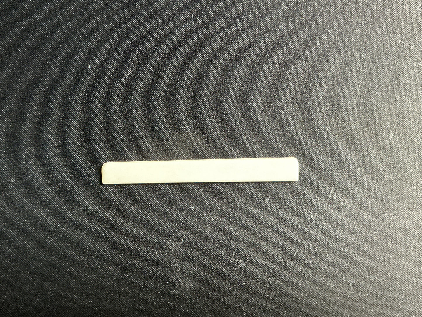 Hueso de guitarra clásica (Puente abajo) Plastico